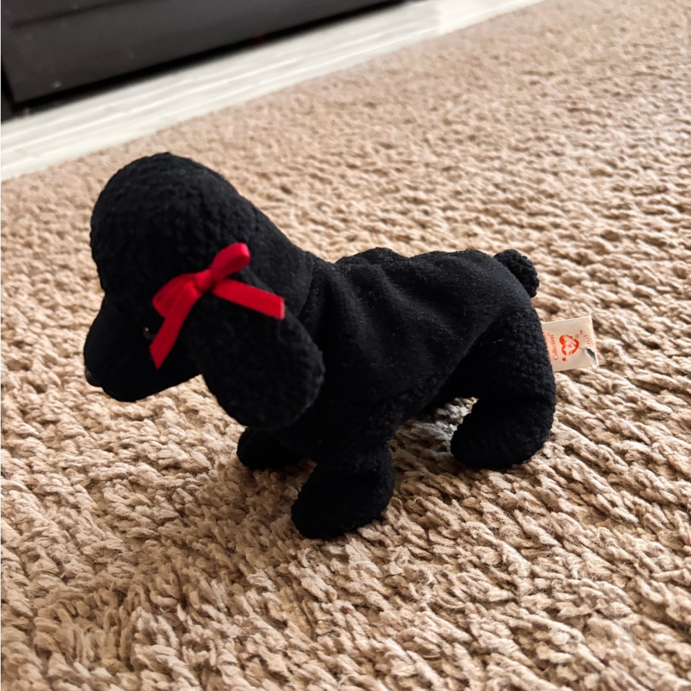 Black Plush Dog Toy with Red Bow